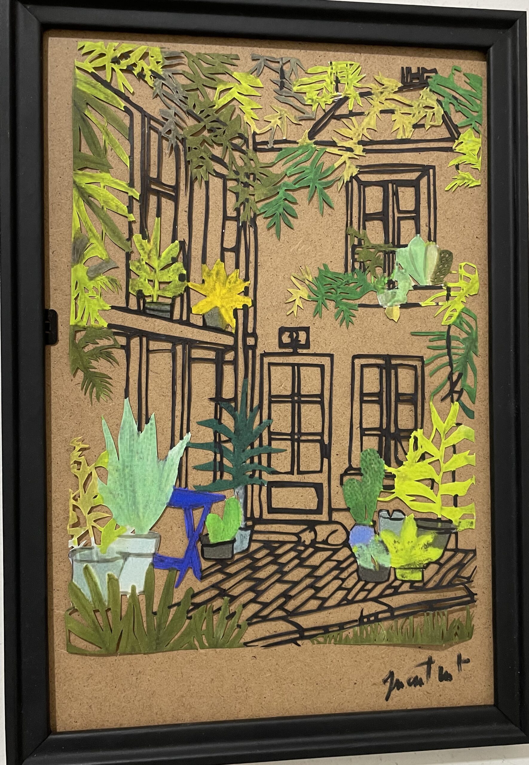 tableau papier découpé d'une maison entouré de nature