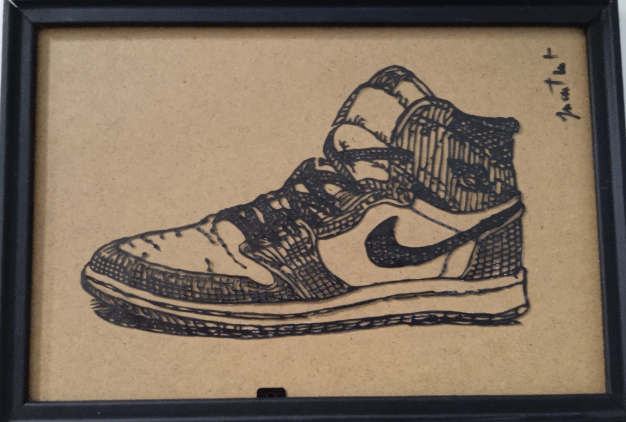 tableau d'une basket nike air en papier découpé