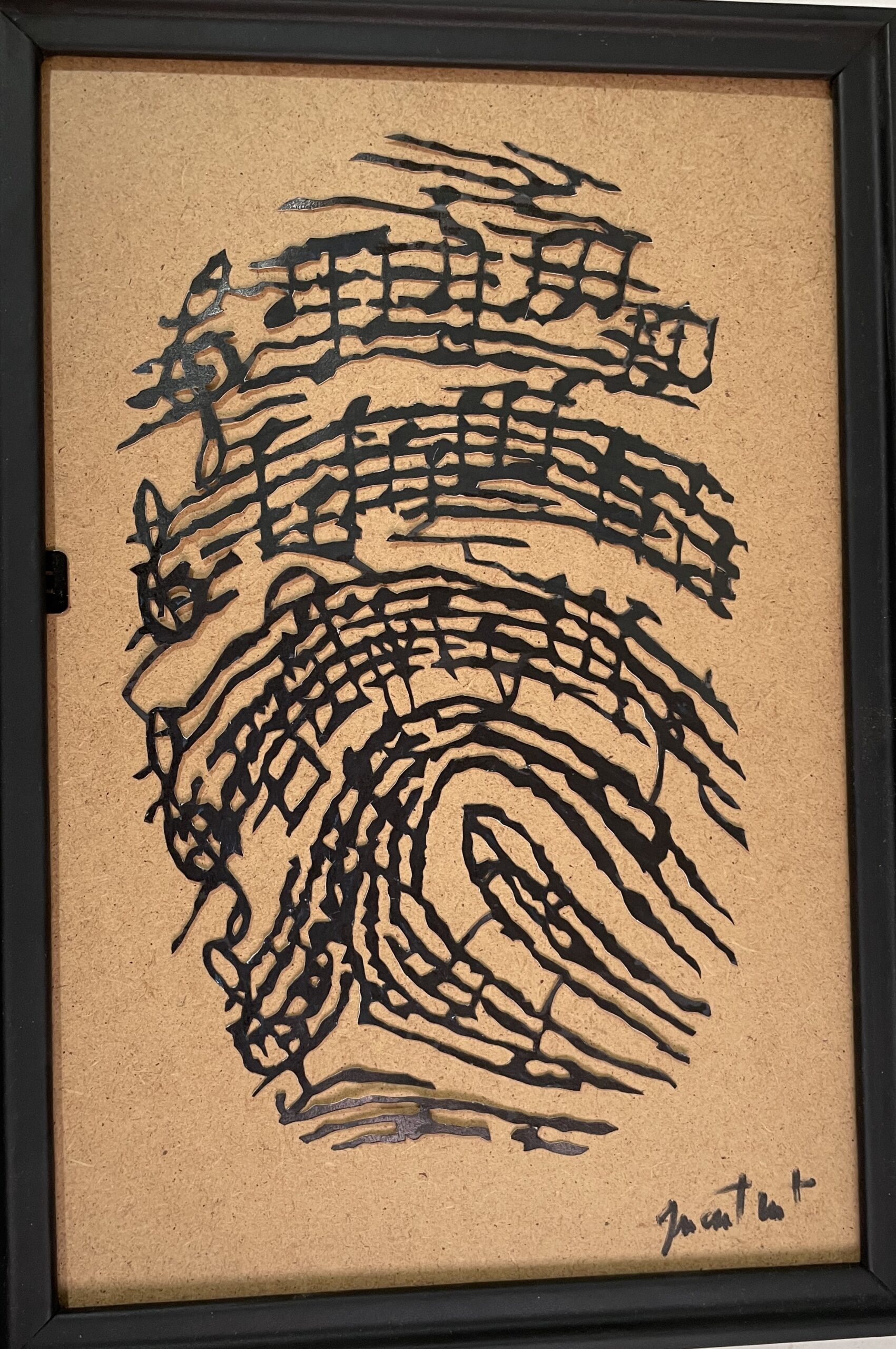 tableau d'uneempreinte musicale en papier découpé