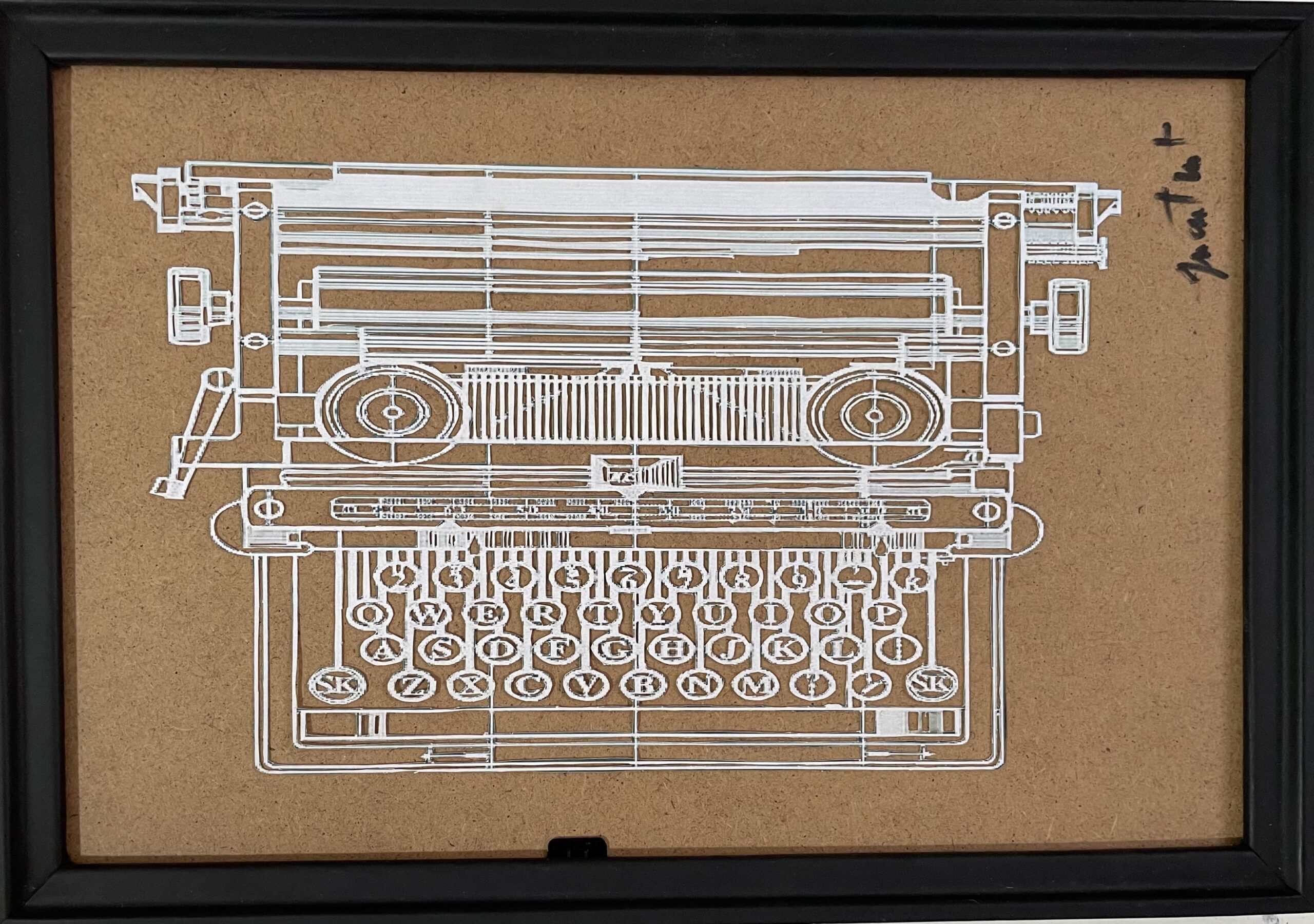 tableau d'une machine à écrire en papier découpé