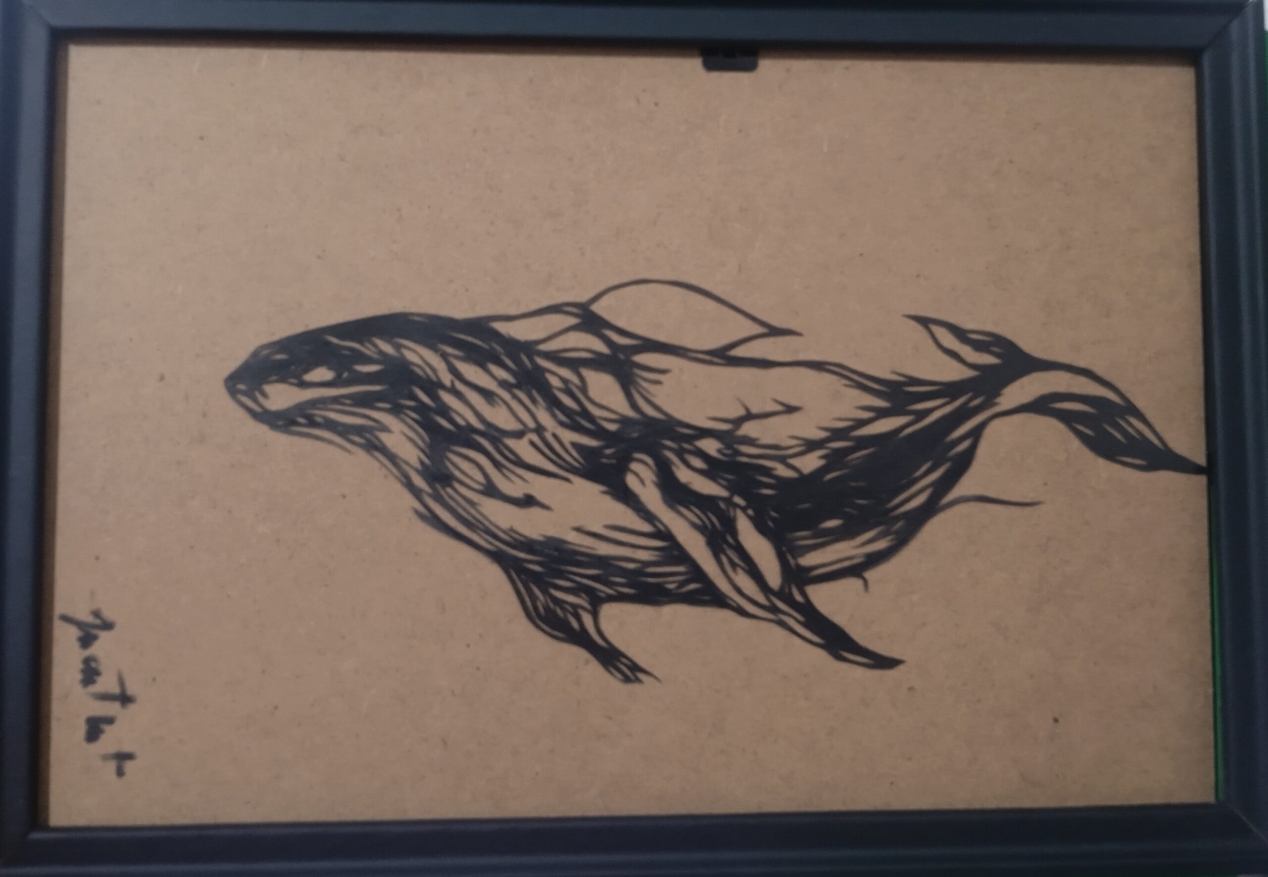 tableau d'une baleine en papier découpé